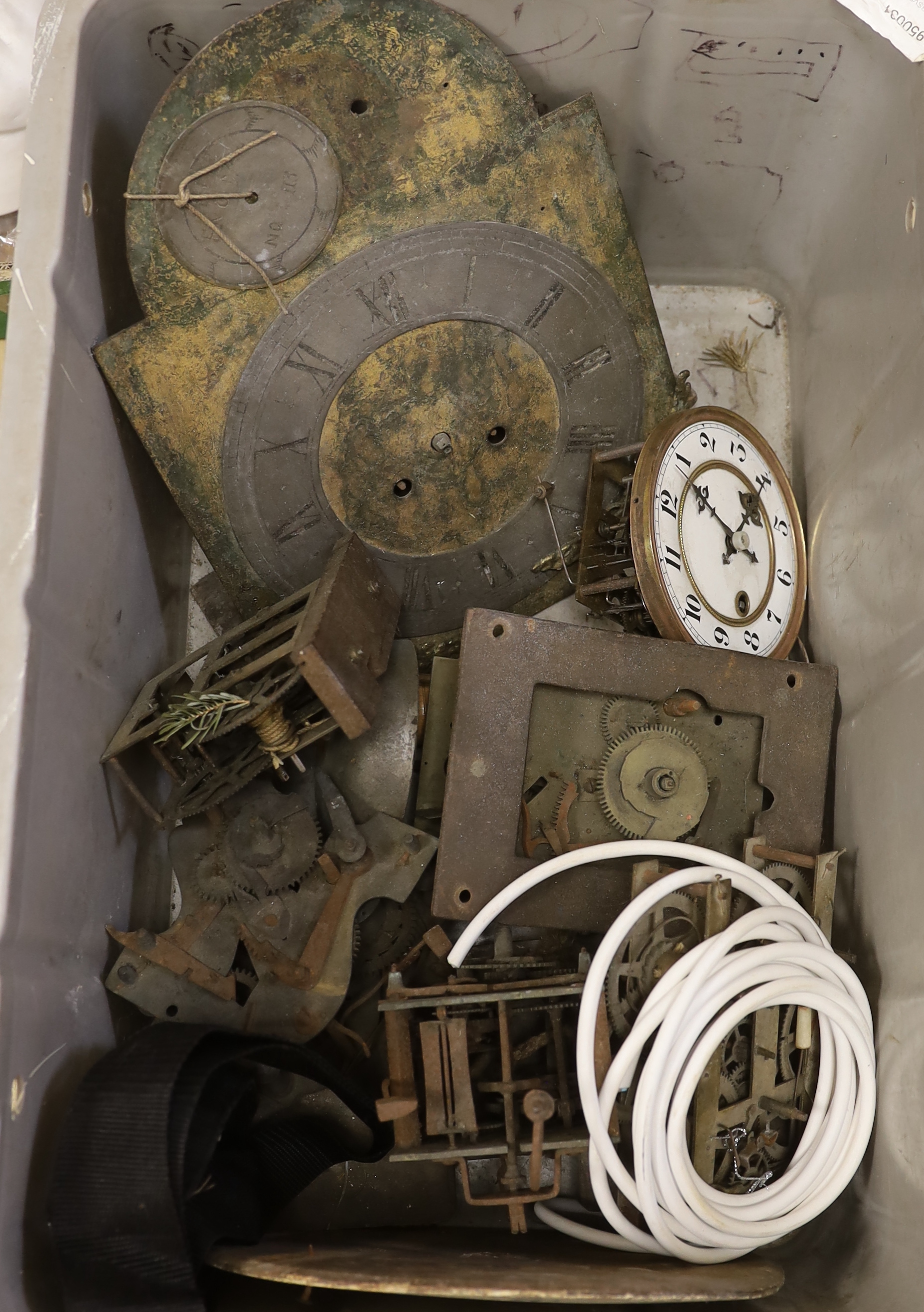 A quantity of clock movements and parts